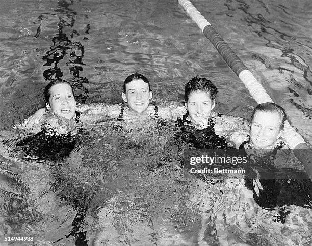 Melbourne, Australia- Photo shows the Australian women's swim team, which won the 4 x 100 meters relay tonight with a new world record of 4:17.1....