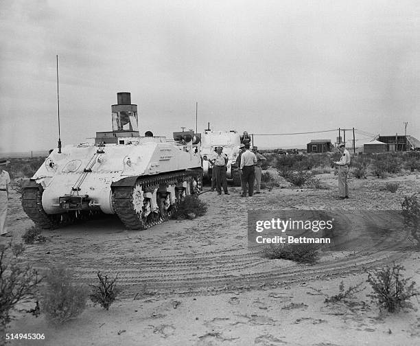 Two Gen. Sherman tanks, specially coated with lead inside, used by scientists to go into the area for study immediately after the first atomic bomb...