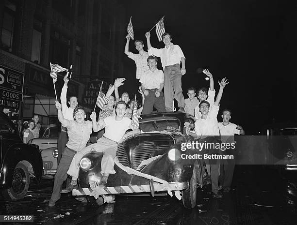 August 14 New York: These youths have a car to help them in their celebration of Japan's surrender to the Allies, and they park in the vicinity of...