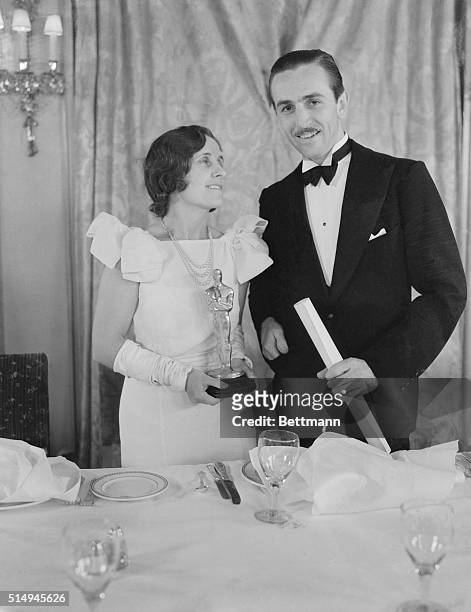 Creator of Mickey Mouse wins MPA award. Walt Disney and Mrs. Disney shown as they attended the banquet of the Motion Picture Academy at Hollywood,...