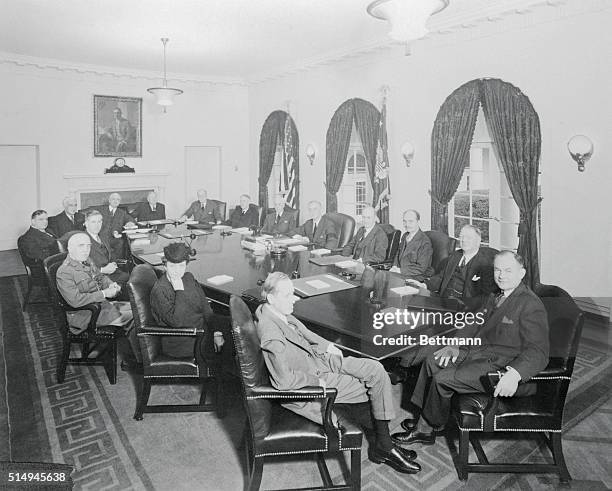 Here is the first picture of President Roosevelt seated with his "war cabinet," which consists of his regular Cabinet in addition to the heads of the...