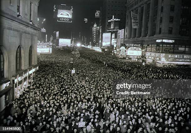 New York, New York- A general view of the crowd in Times Square as the year of 1941 gave it's last gasp and the lusty, war-time infant 1942 came upon...