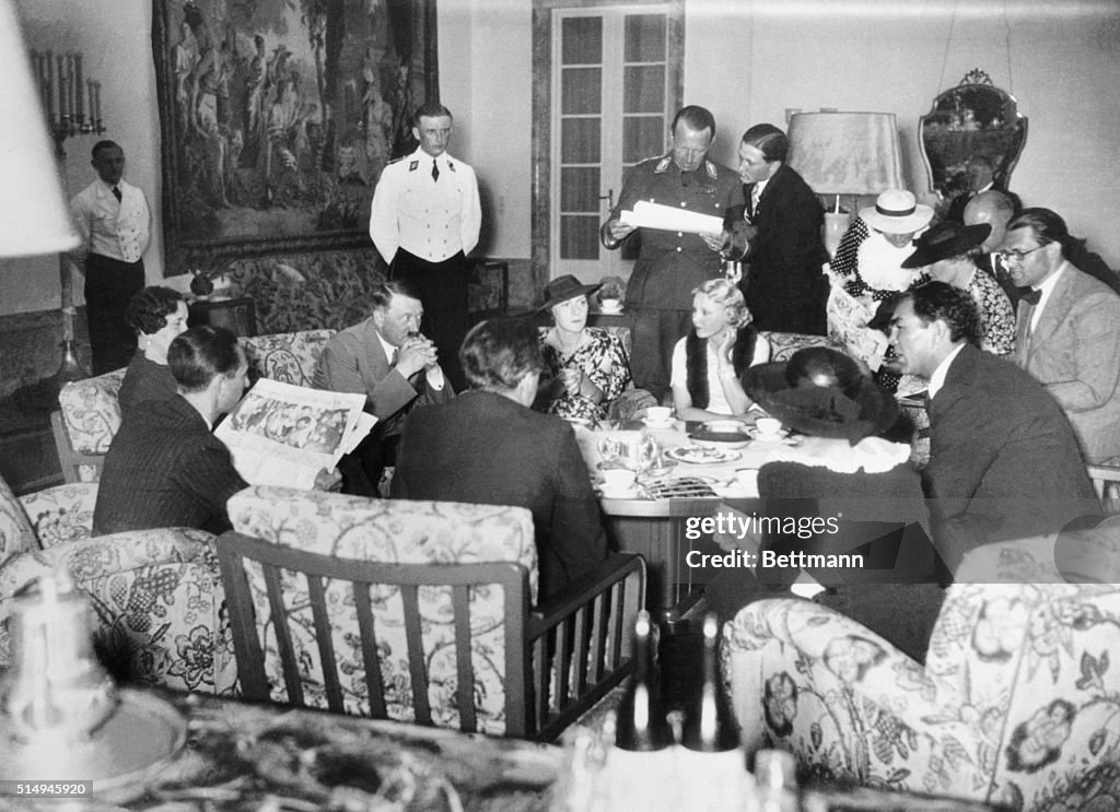Hitler Max Pictured around a luncheon table in Chancellor Hitler's palace, a ...