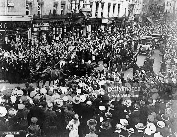 London, England- When the Prime Minister Lloyd George reached London he received a terrific ovation. He was met at Victoria by the King whom he drove...