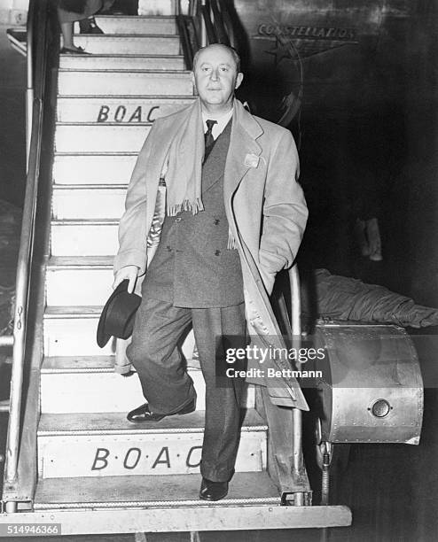 Christian Dior, well known French fashion designer and credited as the originator of the "New Look", arriving at New York International Airport from...