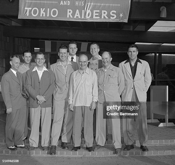 Lt. Gen. Jimmy Doolittle, flanked by some of the men he led on the first bombing attack of the Japanese mainland on April 18 opens fifth postwar...