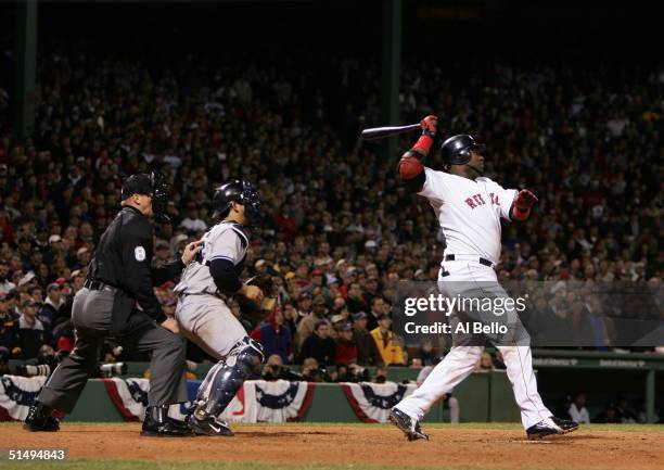 David Ortiz of the Boston Red Sox hits the game winning RBI single in the fourteenth inning to defeat the New York Yankees 5-4 during game five of...