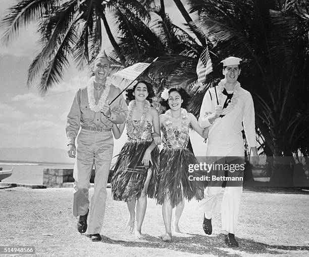 Soldiers Help Celebrate Hawaii's Flag Day Festivities. Waikiki, Hawaii.: The hope of reaching statehood some day was the fundamental thought in...