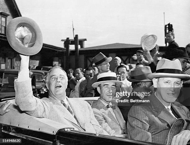 Rockland, ME- President Franklin D. Roosevelt waves to the crowd from his car after leaving the White House Yacht Potomac at Merrills Wharf, here,...
