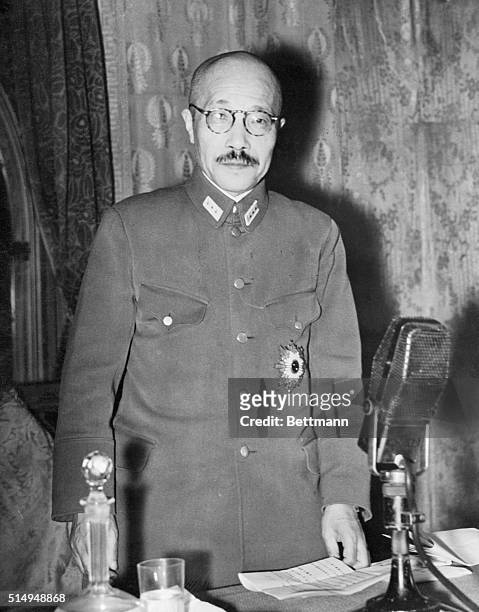 Lieutenant General Hidecki Tojo, Japan's new Premier is shown speaking to the nation from his official residence shortly after the imperial...