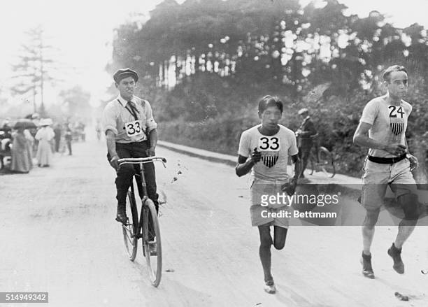 American long-distance runners, Lewis Tewanima and Joseph Forshaw at Iver Heath, Buckinghamshire, during the Marathon event at the London Olympic...