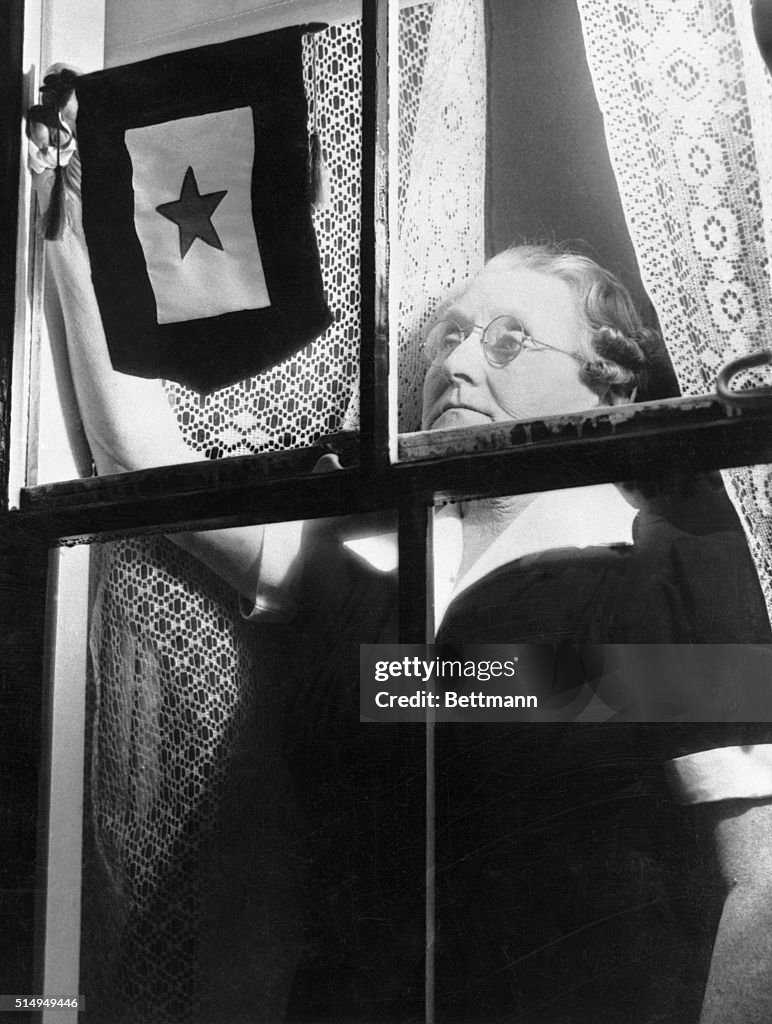 Service Flag Placed in Window of War Hero