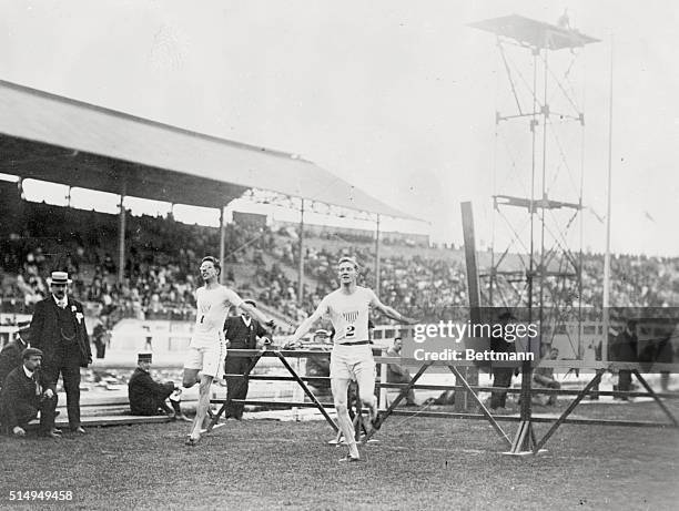 Olympic Games London, England 1908. 400 meters hurdles, last hurdle, Harry Hillman, UP.SE.A and Charles Bacon, UP.SE.A.