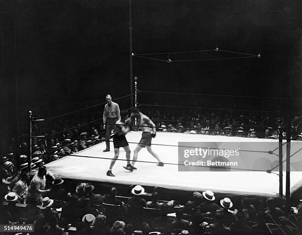 World light heavyweight champion Tommy Loughran boxing against James Braddock at Yankee Stadium.