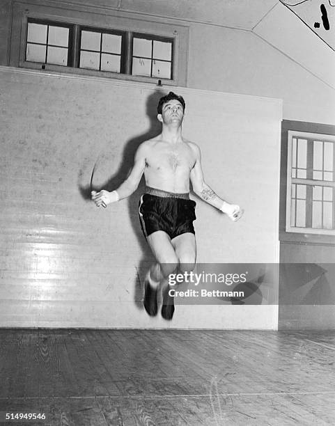 James Braddock, former world's heavyweight champion, skipping rope at his training camp at Pompton Lakes N.J., Jan. 13th, where he is preparing for...