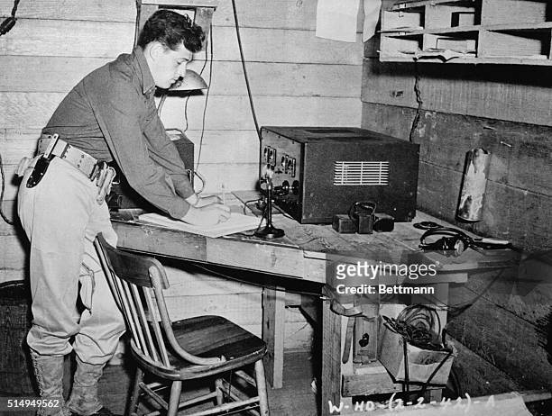 Private Joseph L. Lockard of Williamsport, Pennsylvania, is shown at his radio set in Honolulu. Lockard has been identified as the soldier mentioned...