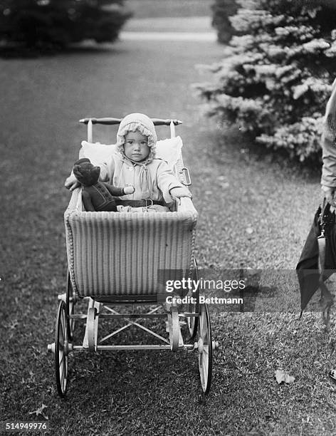 The above exclusive photo shows baby Gloria Vanderbilt, daughter of Mr. And Mrs. Reginald Vanderbilt, photographed on the lawn of the summer home of...