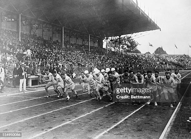 Paris, France- Start of the 3,000 meter Olympic team race. Willie Ritola of Finland is shown on the front line, second from right.