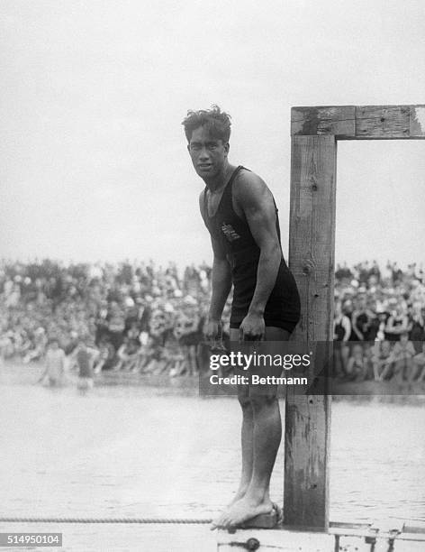 Manhattan Beach, CA- Duke Kahanamoku, of Hawaii, is shown about to dive into the water during a farewell tournament at Manhattan Beach, CA. The...