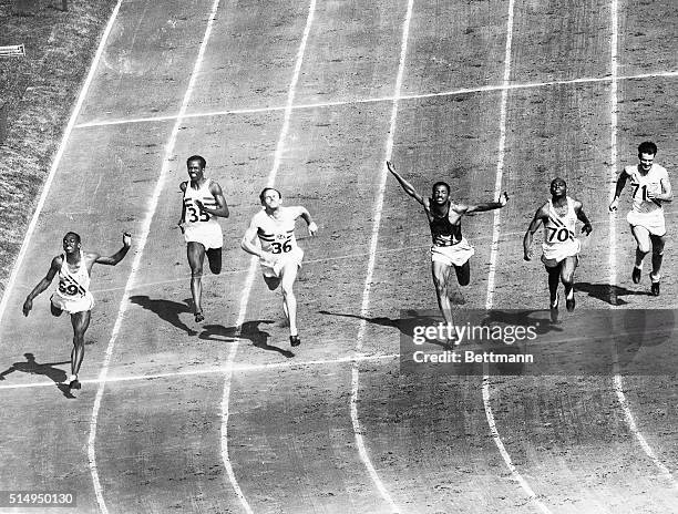 Wembley, England- Harrison Dillard of Baldwin Wallace, wins the Olympic 100-meter dash at Wembley Stadium on July, 31. Time was 10.3, equalling the...