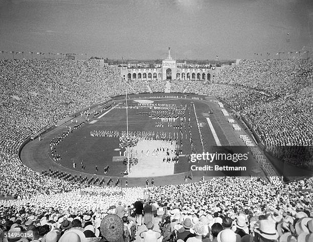 Los Angeles, CA- Almost 2,000 athletes enter the Olympic Stadium in Los Angeles to join in the ceremonies opening the tenth Olympiad.