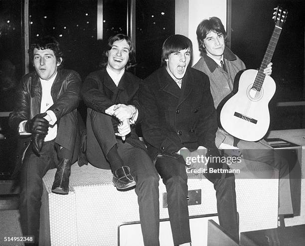 New York, NY- England's new number-one singing group, The Kinks, arrives at Kennedy International airport for American invasion on behalf of Reprise...