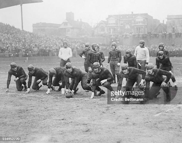 Group photo of the Chicago Bears with Red Grange in the back at the start of the game.
