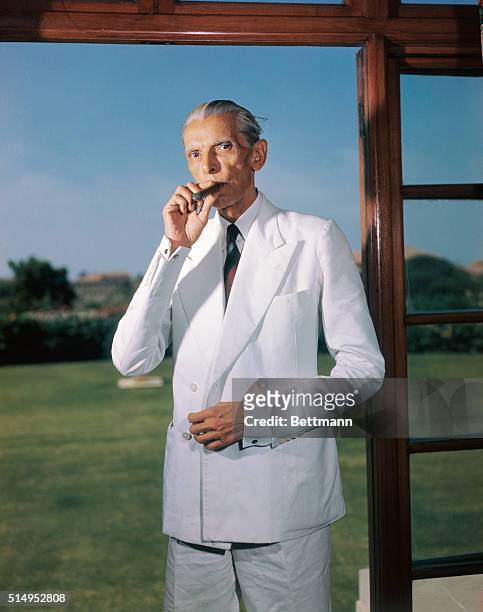 Kodachrome transparencies of Mohammed Ali Jinnah, Governor General of Pakistan. Photo shows Jinnah at doorway of his study in Government House,...