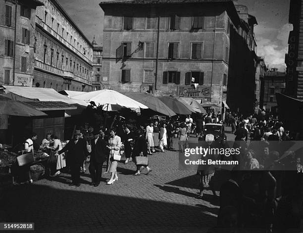 Rome, Italy: A section of Rome's Campo di Fiore , most notorious of the city's markets. This was headquarters for Italian black marketeers during the...