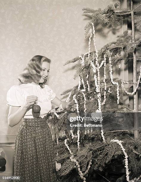 Hollywood, CA- With an scute shortage of all kinds of Christmas tree ornaments facing us this year, screen star, Deanna Durbin, comes forth with a...