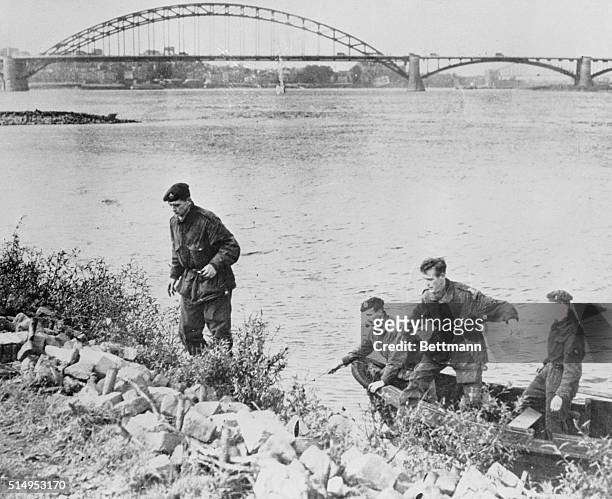Four British paratroopers who were captured on the last outpost on Arnhem Bridge and taken captives to Germany are shown, as they later escaped...
