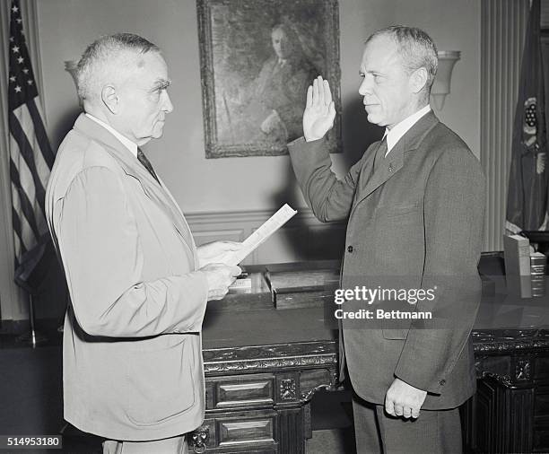 New War Secretary Takes Oath. Washington, D.C.: Robert P. Patterson sworn in as Secretary of War by Judge Learnard Hand of N.Y. City during...