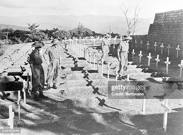 Far from the White Cliffs of Dover. Kohima, Nagaland, India: Men of the Royal West Kent Regiment stand and pay silent tribute to comrades who fell in...