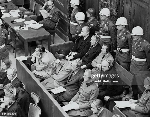 Nuremberg, Germany: Here are shown the defendants in the Nuremberg War Criminals Trial as they sit in various attitudes during the phases of the...