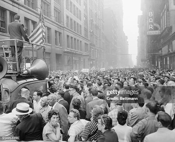 Tremendous throng packs 17th street in New York between Broadway and Fifth Avenue, June 19, to listen to speeches condemning the imminent execution...