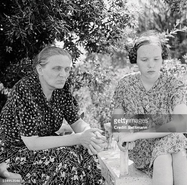 Frau Margareta Himmler, widow of Heinrich Himmler, Nazi Gestapo Chief, and her daughter, Gudrun, are shown at the allied detention camp near Rome,...