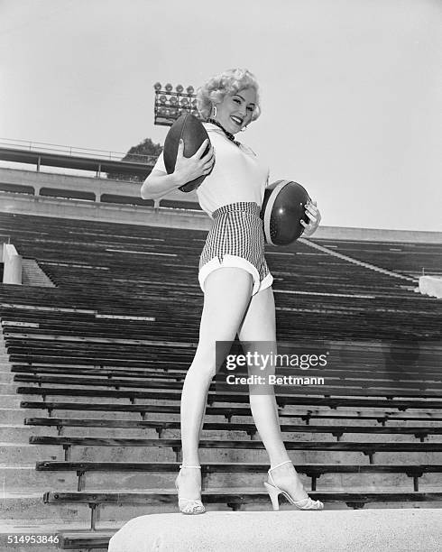 First named nominated for 1953 "All American" honors goes to blonde Mamie Van Doren who launches the current cinema football season playing a...