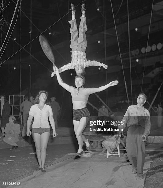New York: Heading For Circus Opening--Nio Lin Tang lets Midget Harry Klime go to her head, as they rehearse their act for the New York opening, April...