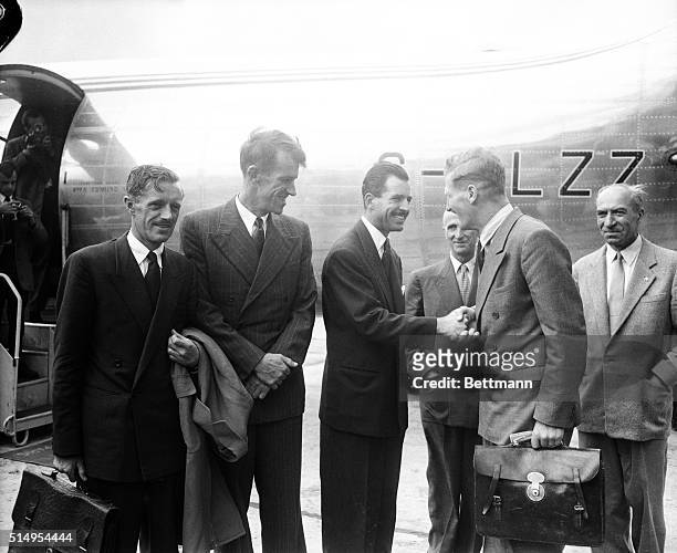 Paris: French climber, Maurice Herzog, welcomes members of British Expedition who climbed Mt. Everest - including Sir Edmund Hillary.