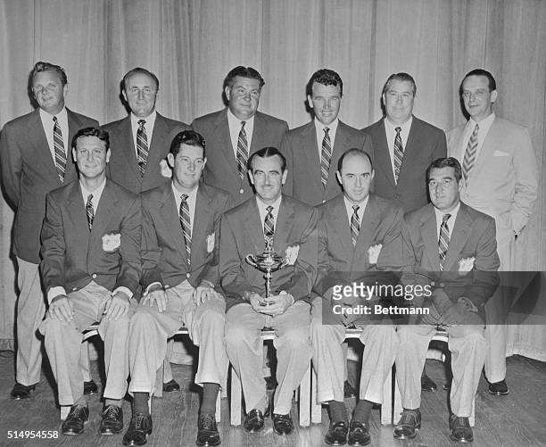 Members of the Ryder Cup golf team pose for a group shot at a farewell dinner at Kiamesha Lake, New York, before they embark for England . They'll...