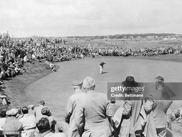 Ben Hogan, winner of the British Open Golf Championship, is shown putting on No.2 green during his game with Ugo Grappasoni of Italy. Hogan rallied...