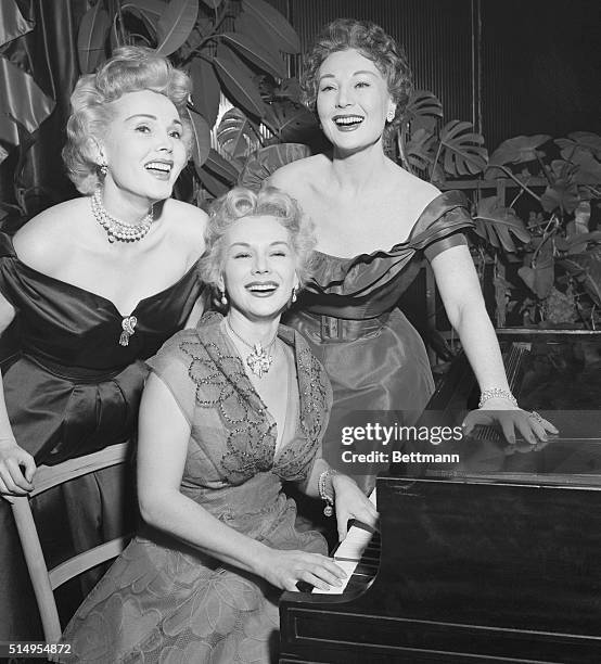 Zsa Zsa , Eva , and Magda Gabor , glamorous trio of sisters doing a night club stint at Ciro's, appear at an interview, during which they claimed...