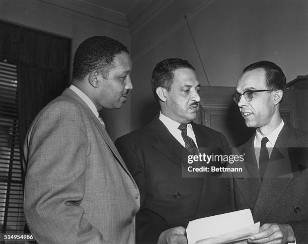 Negro attorneys Harold R. Boulware , Columbia, S.C., and Spotswood Robinson III , who are arguing against segregation before the Supreme Court,...