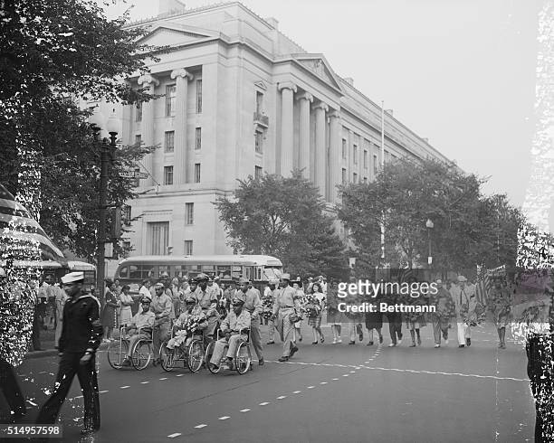 View of a march held in Washington on August 6, 1946 by an estimated 10,000 mourners who marched down Constitution Avenue and held a memorial service...