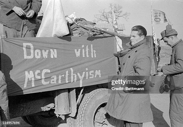 British Pow Andrew Condron, who renounced his country and turned to Communism, prepares to board a truck which will carry him and other POW's norrth...