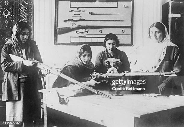 Women workers of Soviet Union taught to use gun...Soviet women workers at Baku, Russia, are taught the use of a gun, to be ready to take up arms for...