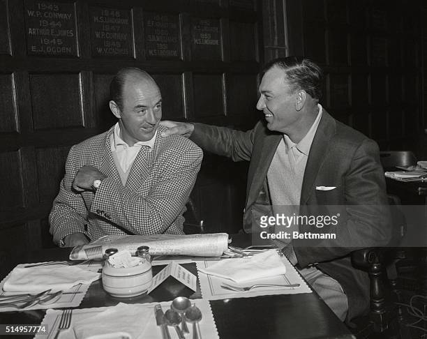 Slammin' Sammy Snead has his stiff neck and shoulder examined by "doctor," golf doctor that is, Ben Hogan, at Balstusrol golf course in Springfield,...