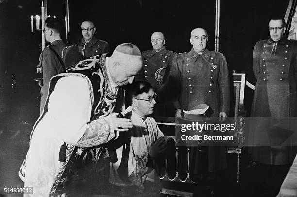 Generalissimo Francisco Franco, El Caudillo of Spain, is shown as he attended a memorial mass held in the Army Ministry for General Primo de Rivera,...