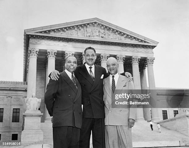 Attorneys who argued the case against segregation stand together smiling in front of the U. S. Supreme Court Building, after the High Tribunal ruled...