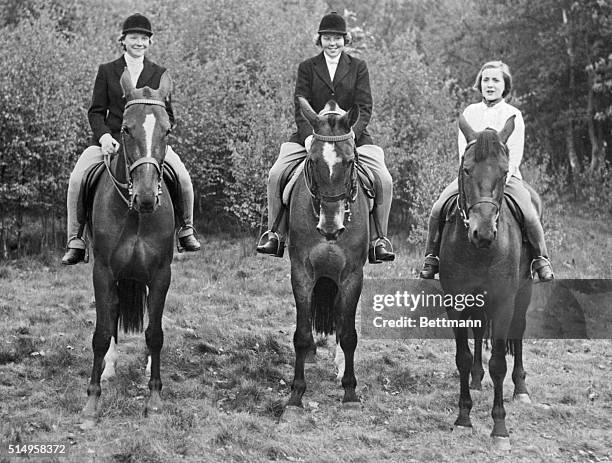 Royal Trio. Amsterdam, Netherlands: A real Dutch treat is the sight of these three lovely Princesses out for a ride through the woods on fine horses....